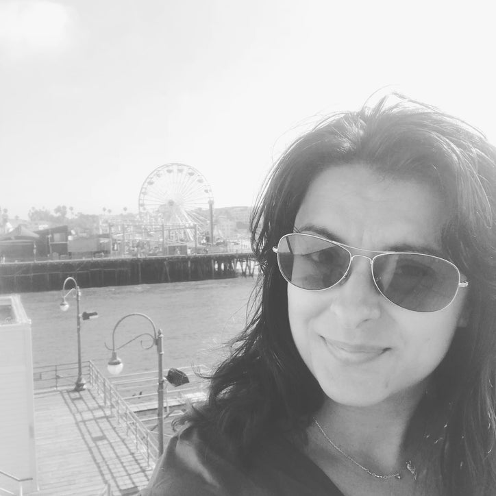 Foto van Yvonne genomen op de Santa Monica Pier tijdens een soloreis van 3 maanden.